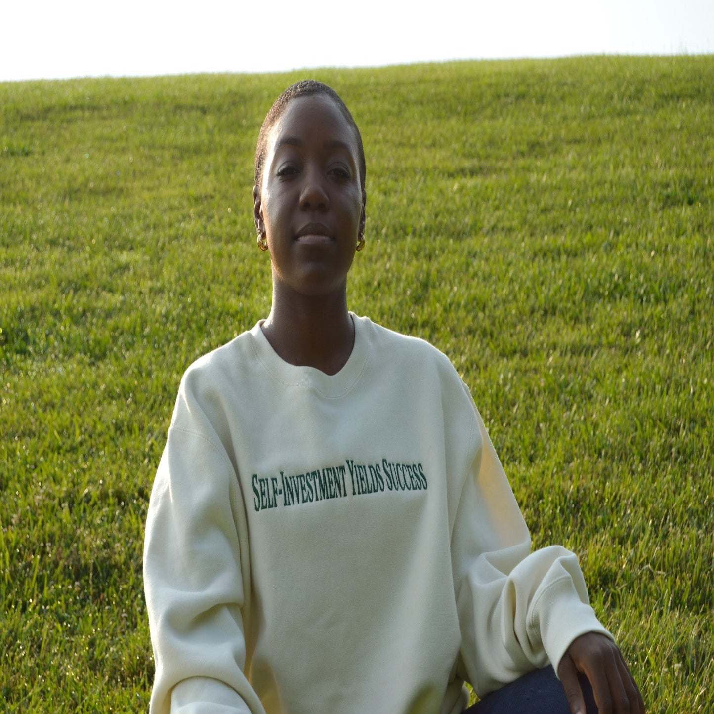 Self-Investment Yields Success Premium Crewneck